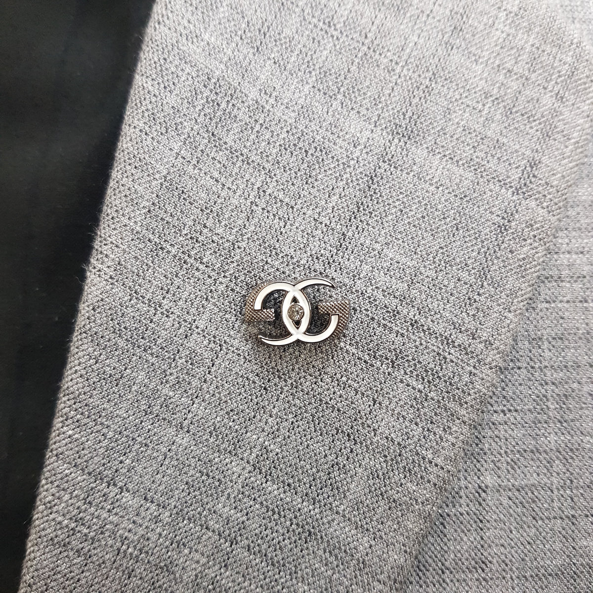 Silver Interlock Crest Lapel Pin
