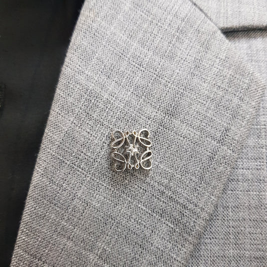 Silver Regal Loop Lapel Pin