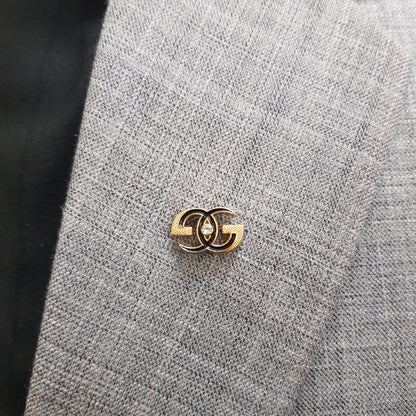 Golden Interlock Crest Lapel Pin