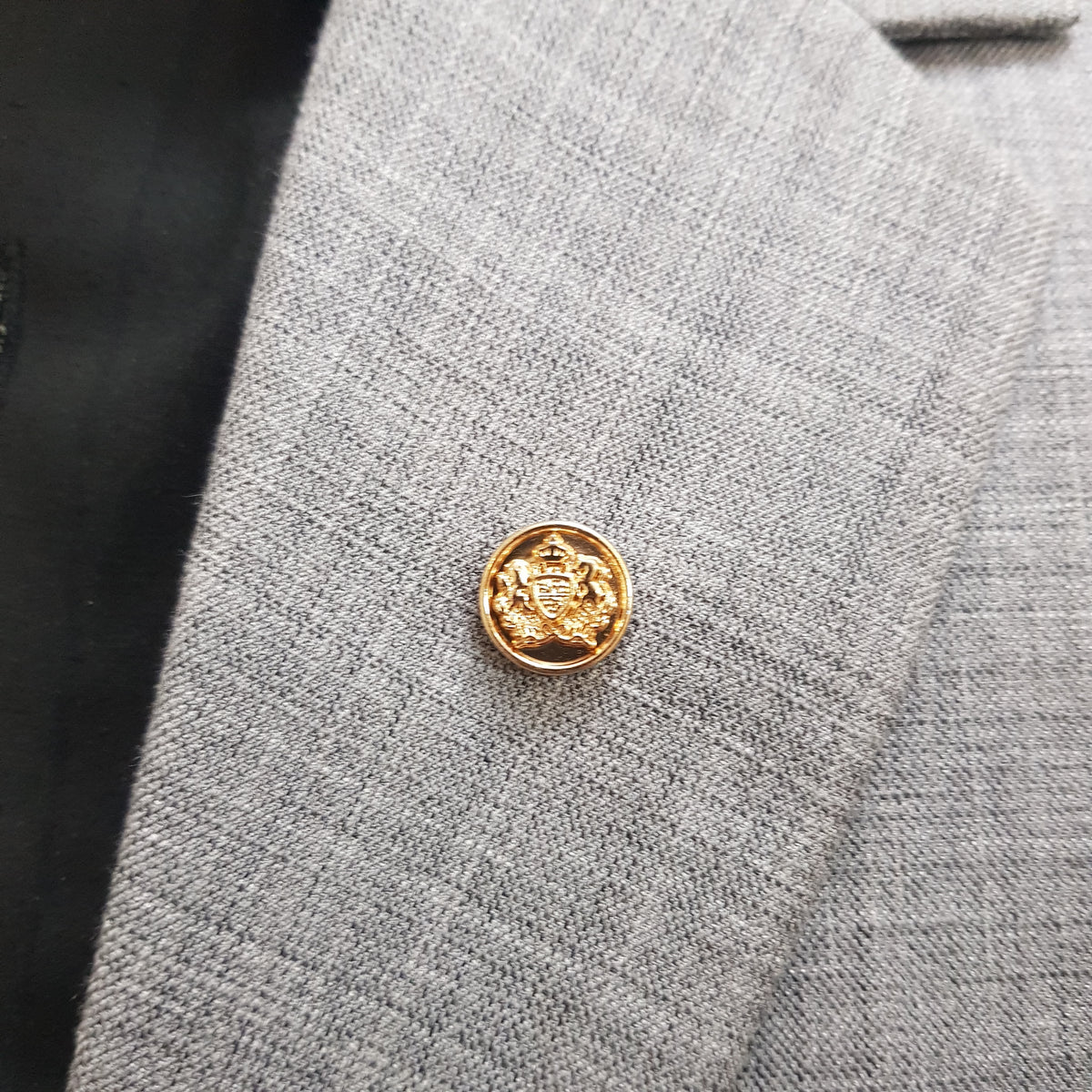 Golden Noble Crest Lapel Pin